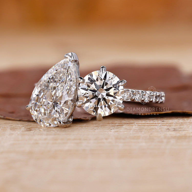 V prong setting ring with Toi Et Moi style and lab grown diamonds.
