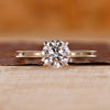 Yellow gold engagement ring with round cut diamond ring.
