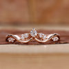Curved wedding band with stackable wedding band.