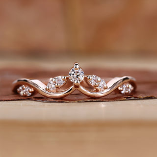 Curved wedding band with stackable wedding band.
