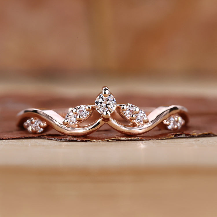 Curved wedding band with stackable wedding band.
