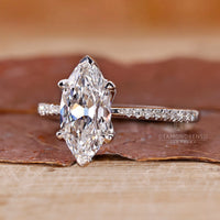 V prong setting diamond ring in white gold with elegant marquise design.
