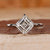 Asscher cut diamond ring with solitaire engagement ring.
