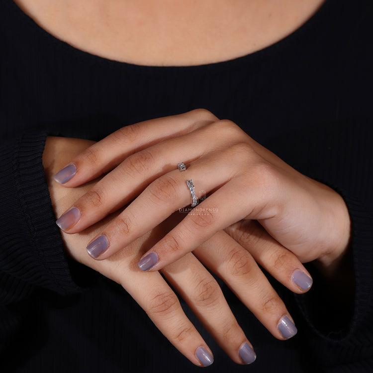 Open gap wedding band with emerald cut wedding band.
