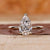 Pear diamond ring with v prong setting.
