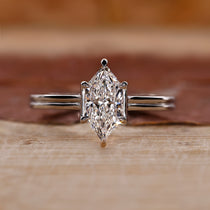 Dutch marquise engagement ring with dual shank setting.
