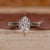 Dutch marquise engagement ring with dual shank setting.

