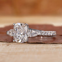 Hidden halo engagement ring in round diamond pave setting ring.
