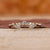 Marquise and round wedding band with tiara wedding band.
