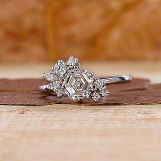 cluster engagement ring with marquise round side stone.
