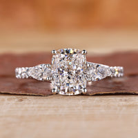 Elongated Cushion Cut Diamond Ring with 3 Stone engagement ring.
