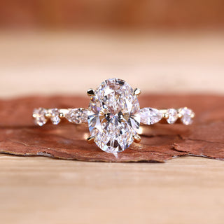 Oval shaped engagement ring with four claw prong setting.
