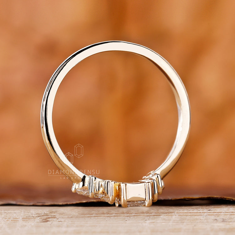 Crown wedding band with tapered baguette wedding band.