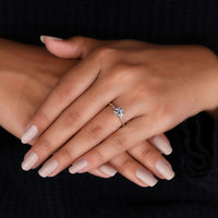 yellow gold ring with pinched shank detail.
