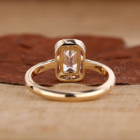 Solitaire engagement ring paired with compass prong setting.
