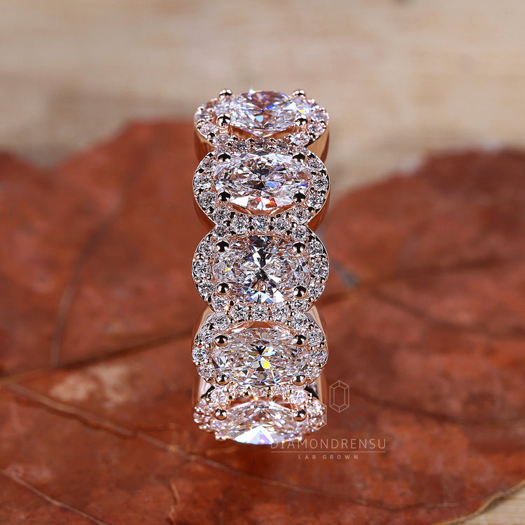 5 stone engagement ring with classic oval centre.

