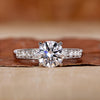 Hidden halo engagement ring with round cut diamond ring.
