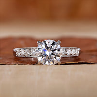 Hidden halo engagement ring with round cut diamond ring.
