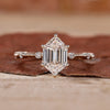 yellow gold engagement ring with distance pave ring.
