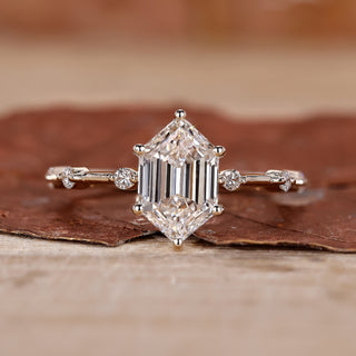 yellow gold engagement ring with distance pave ring.
