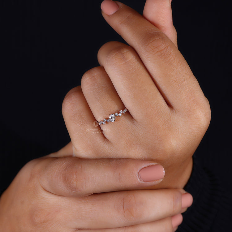 Prong setting secures the oval diamond for a refined look.
