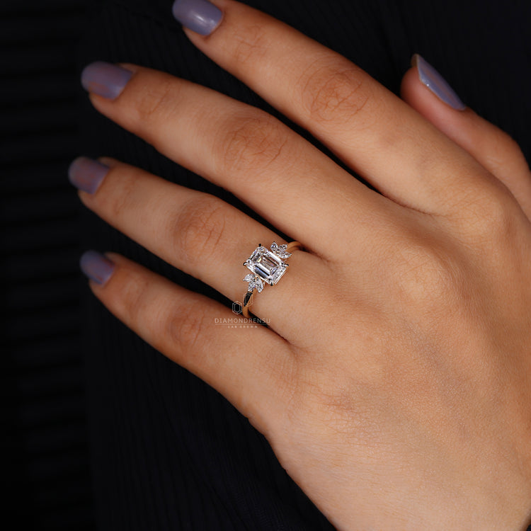 Buy emerald cut engagement ring with marquise accents.
