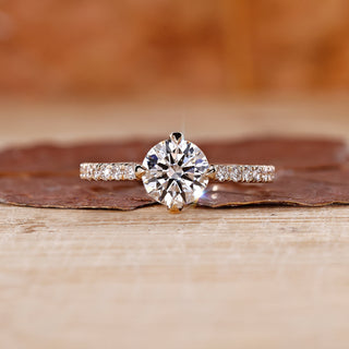 Yellow gold diamond ring with round cut diamond ring.
