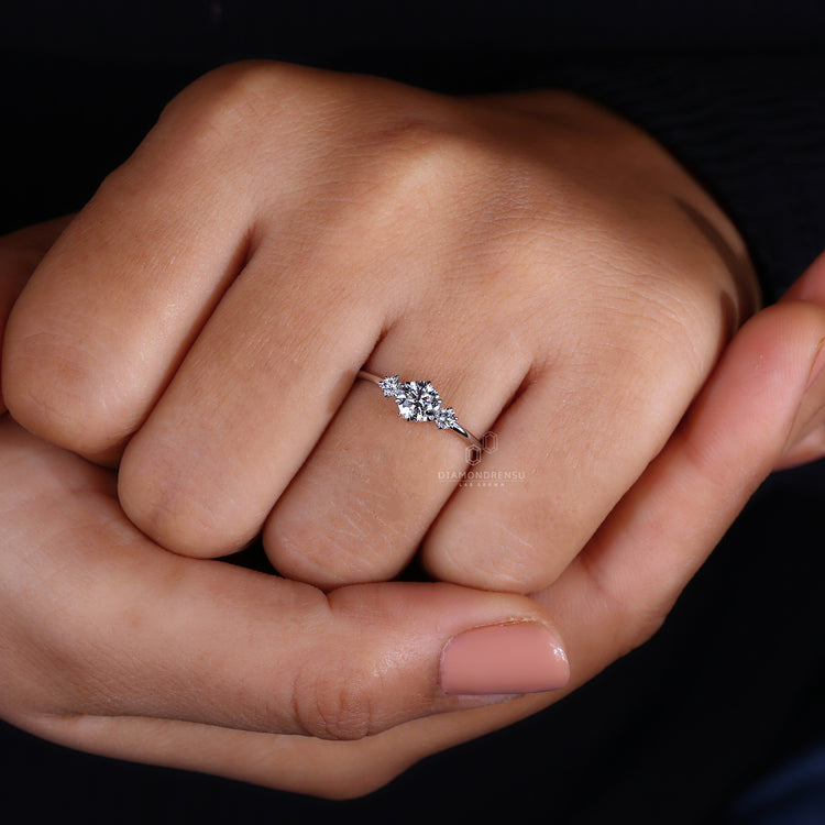 IGI certified engagement ring with three round stones.

