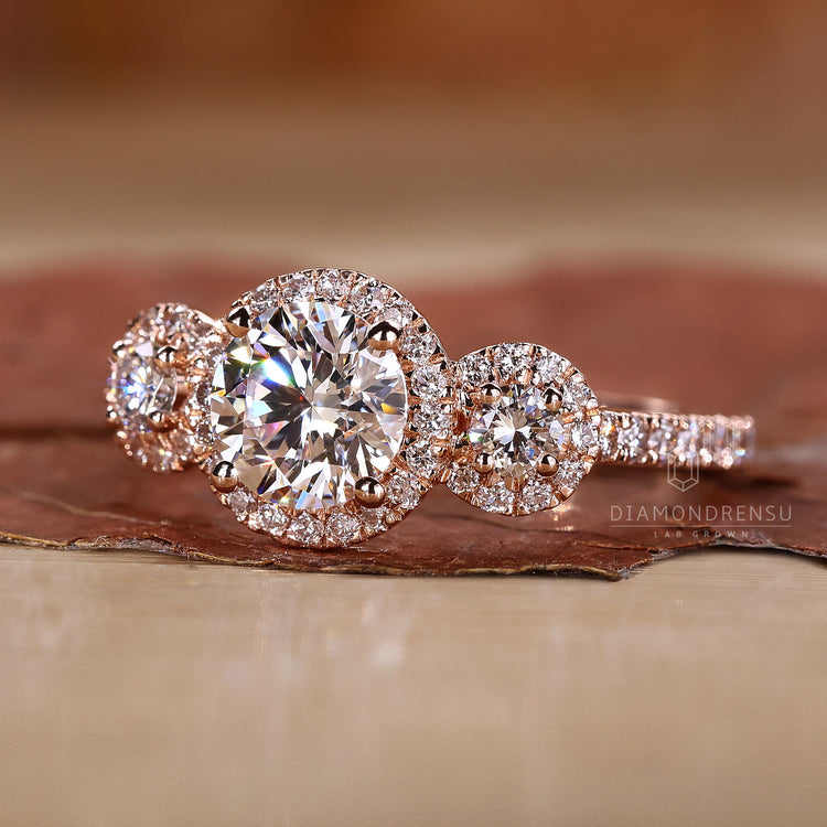 Bridge accent engagement ring with pavé set side diamonds.
