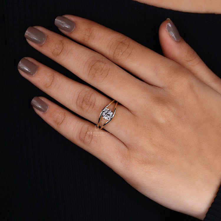 God’s eye ring in split shank engagement ring design.

