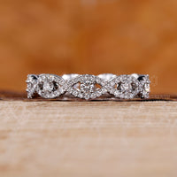 Twisted Design Band with full eternity round cut diamonds.

