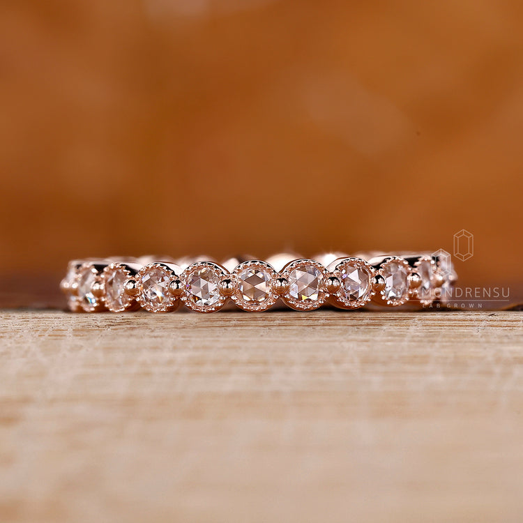 Rose Gold Band with round rose cut diamonds in milgrain finish.
