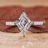 Pave setting ring with lozenge cut engagement ring style.
