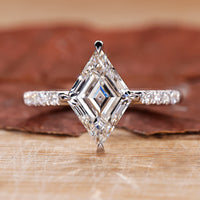 Pave setting ring with lozenge cut engagement ring style.
