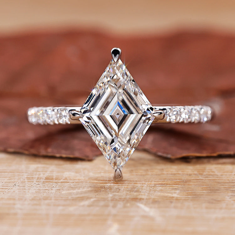 Pave setting ring with lozenge cut engagement ring style.
