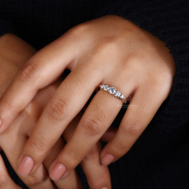 Handmade band with prong setting style.

