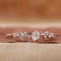 Oval diamond engagement ring with a sleek modern design.
