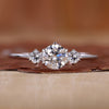 3 stone engagement ring with round centre diamond.
