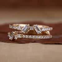Baguette diamond wedding band with cluster diamond band.
