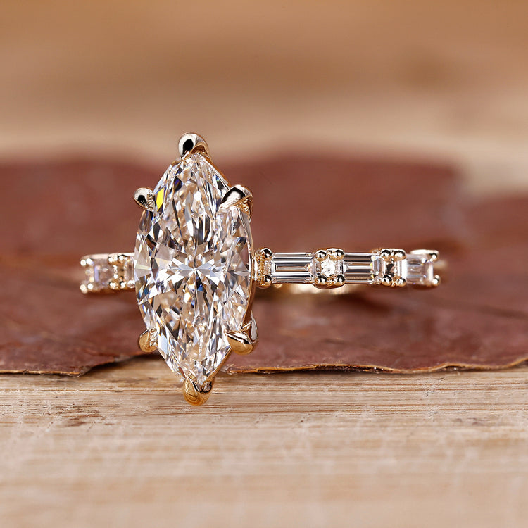 Pave setting ring with Baguette and round cut side stone.
