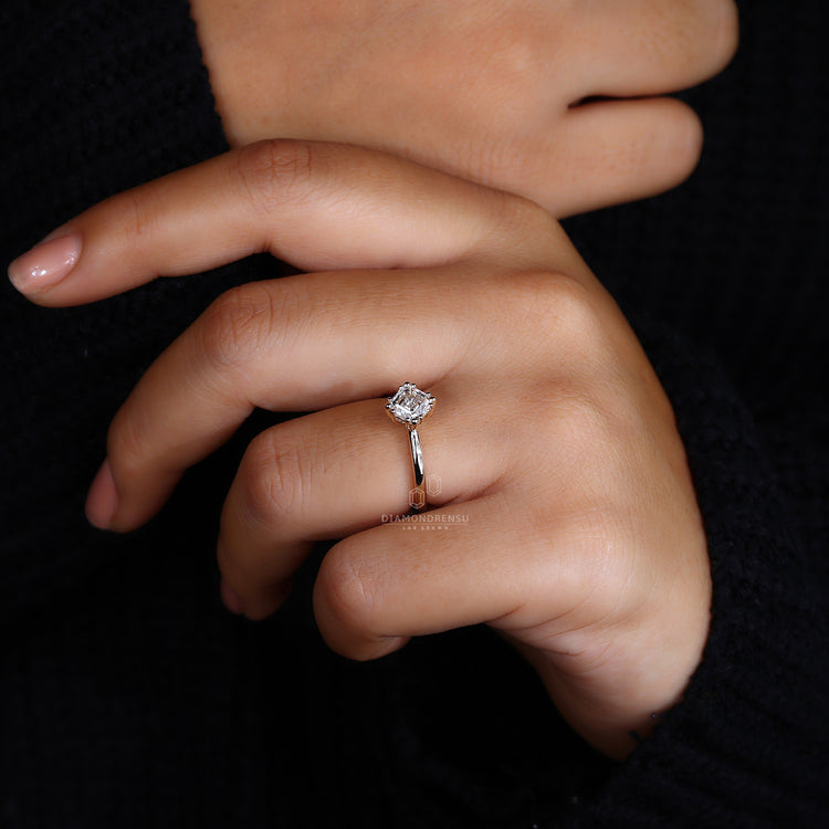 Custom ring design with asscher cut diamond.
