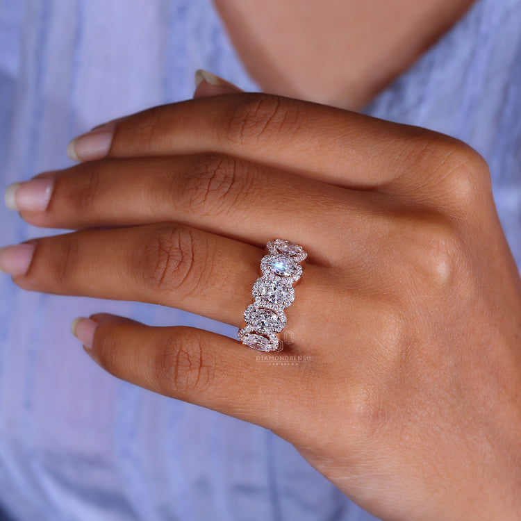 Buy Engagement ring with oval centre stone.
