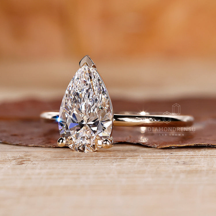 Designer pear diamond engagement ring.
