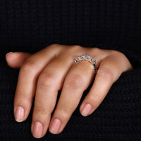 Yellow gold band with round diamond style.
