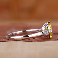 White gold diamond ring with pear diamond ring.
