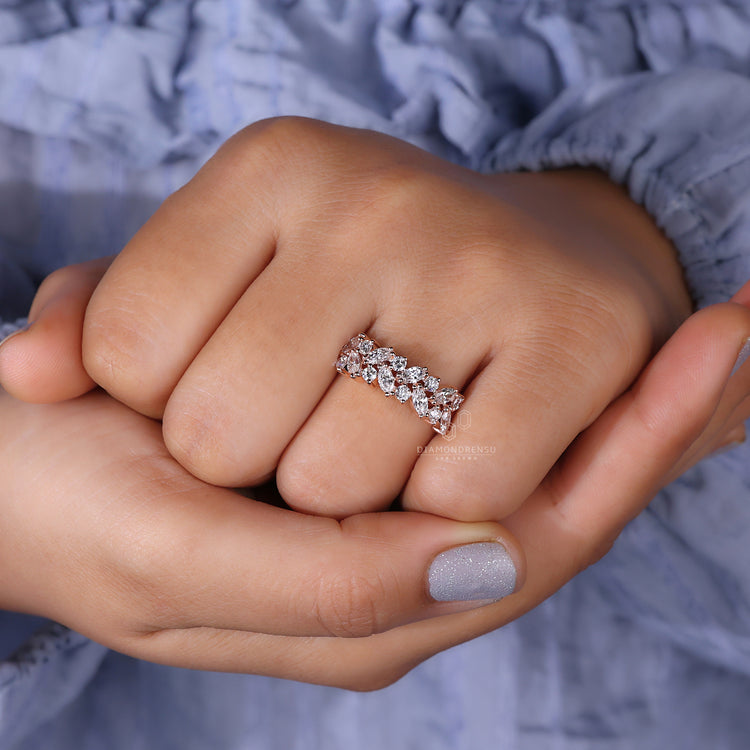 Handmade jewelry for marquise and round wedding band.
