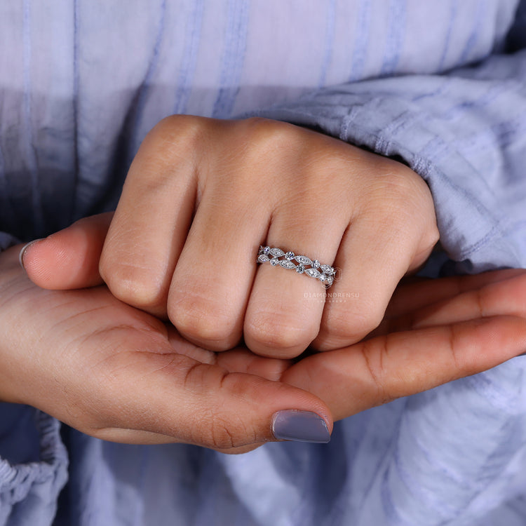 Handmade jewelry shows custom diamond band.
