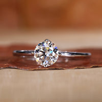Solitaire engagement ring with a clean and minimal design.
