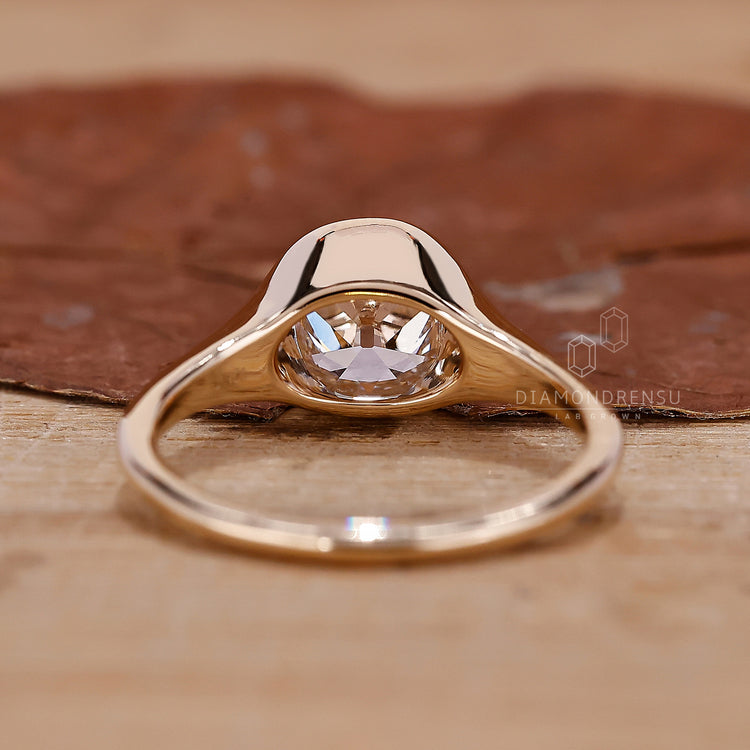 Buy Engagement ring made with bezel set ring.
