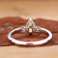 Buy Engagement ring with yellow diamond pear engagement ring.
